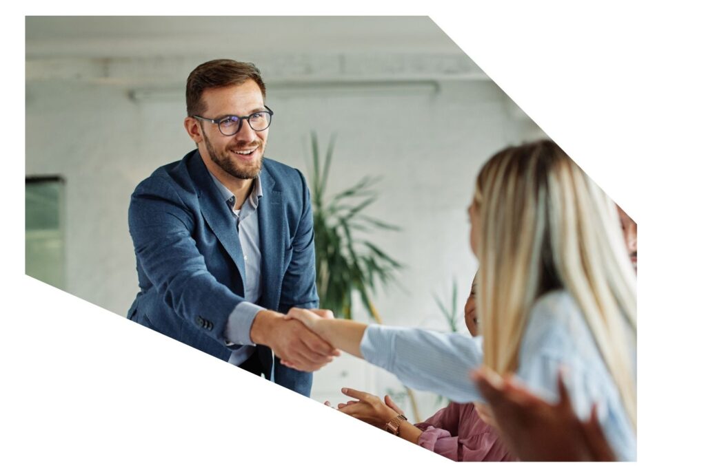 Business man and woman shaking hands ASIC and Corporate Services​